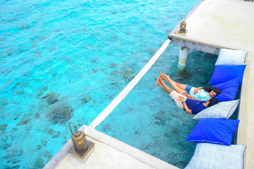 Couple Relaxing at Maldives Resort, Via:Asad.photo