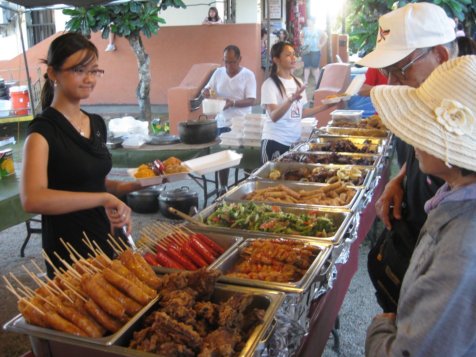 Savour traditional food at Chamorro Village Market, Guam