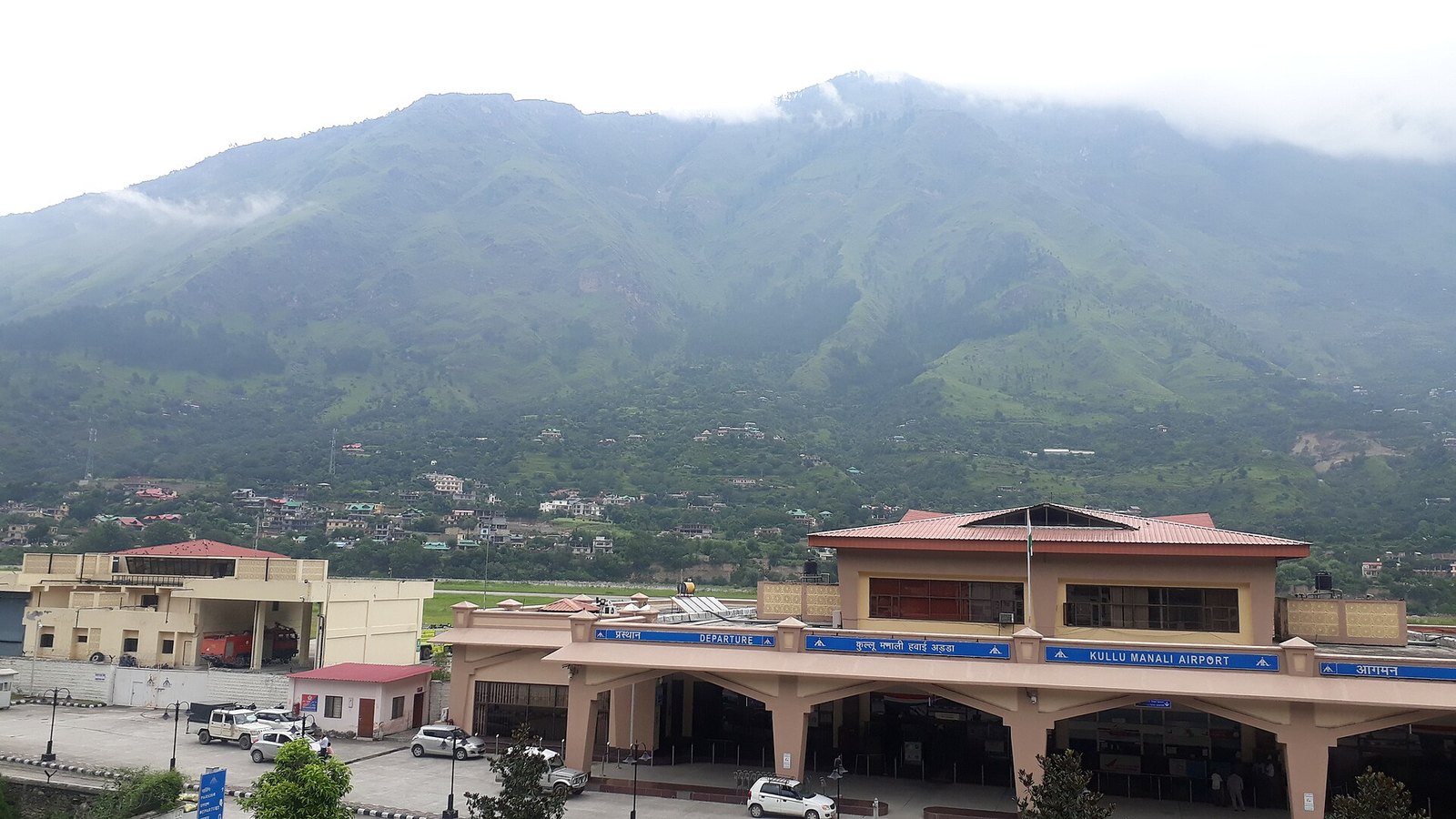 Kullu Manali Airport terminal at Bhuntar below green hills