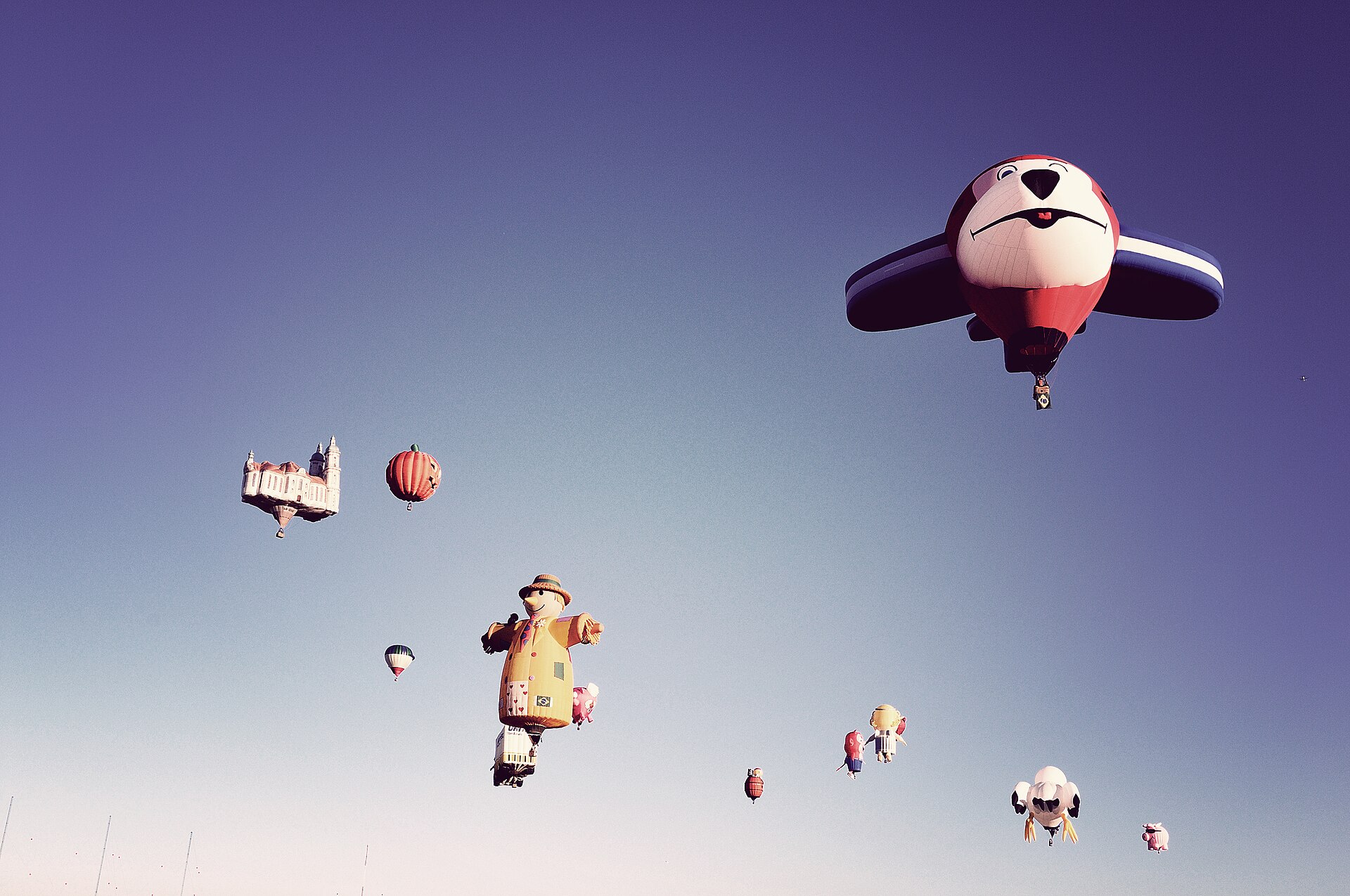Special shape balloons in flight during the Special Shape Rodeo in Albuquerque