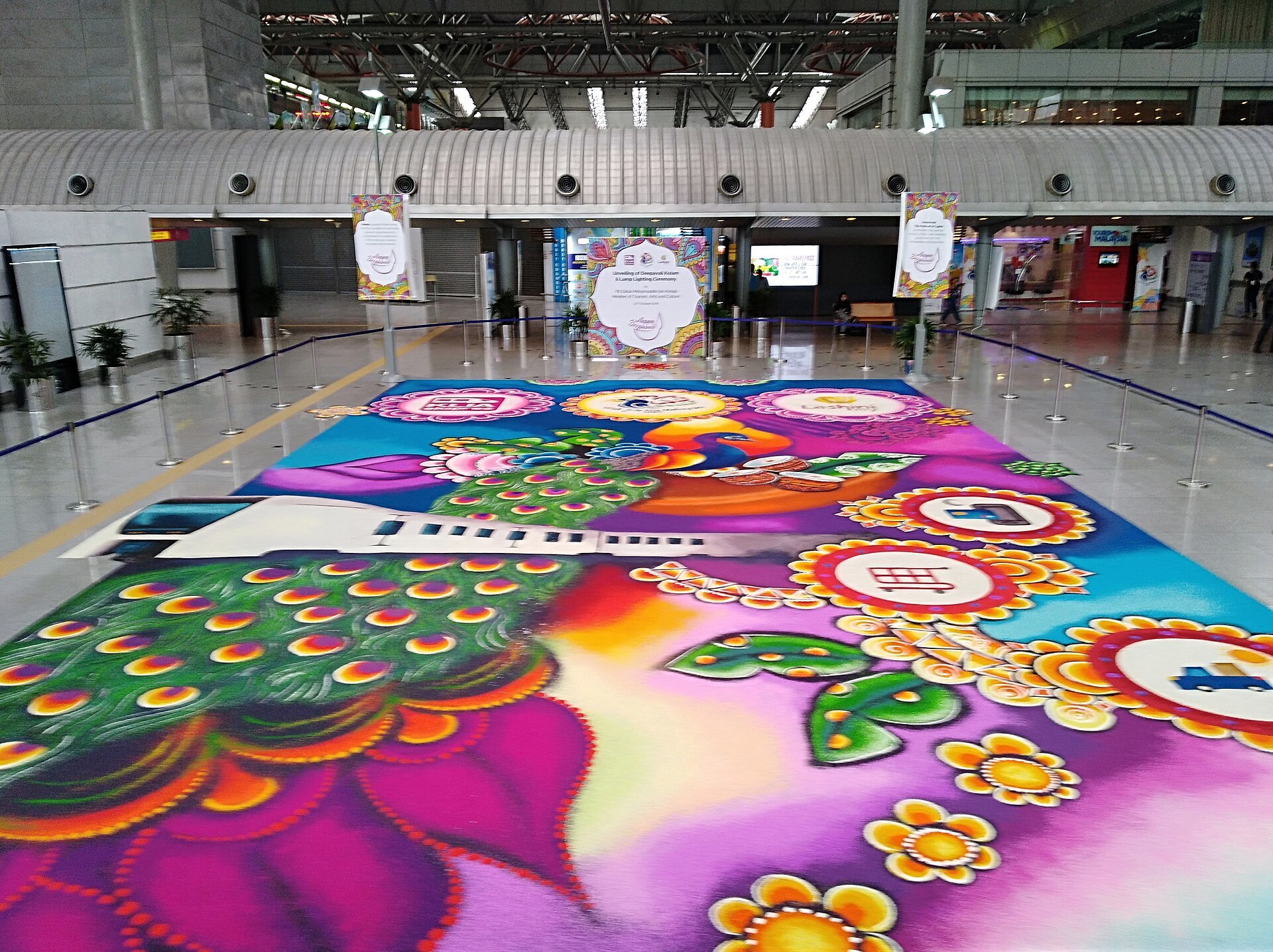 Large peacock kolam made for Deepavali at KL Sentral station in Brickfields, Kuala Lumpur