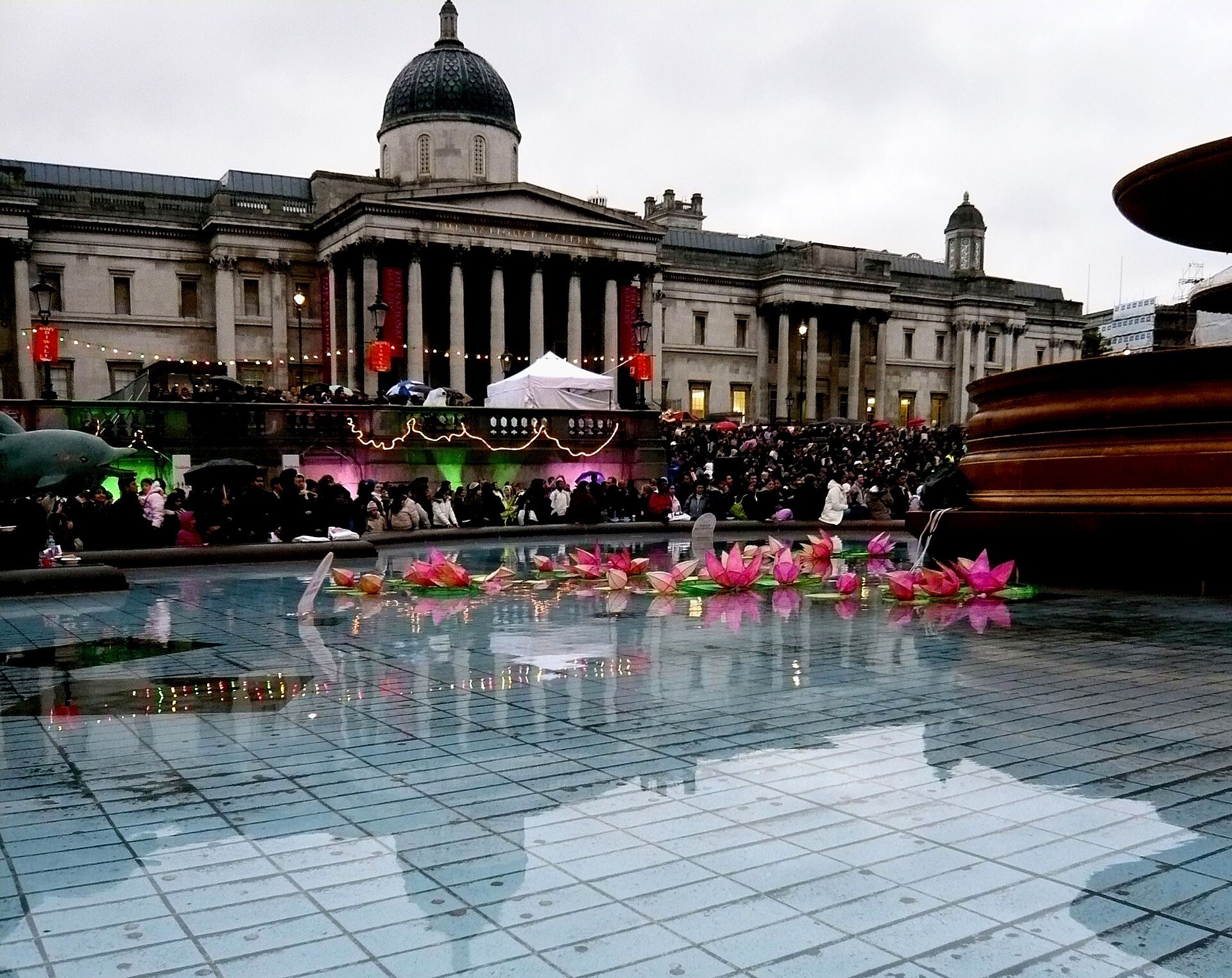 Lotus lanterns floating in the Trafalgar Square fountain during Diwali on the Square in London