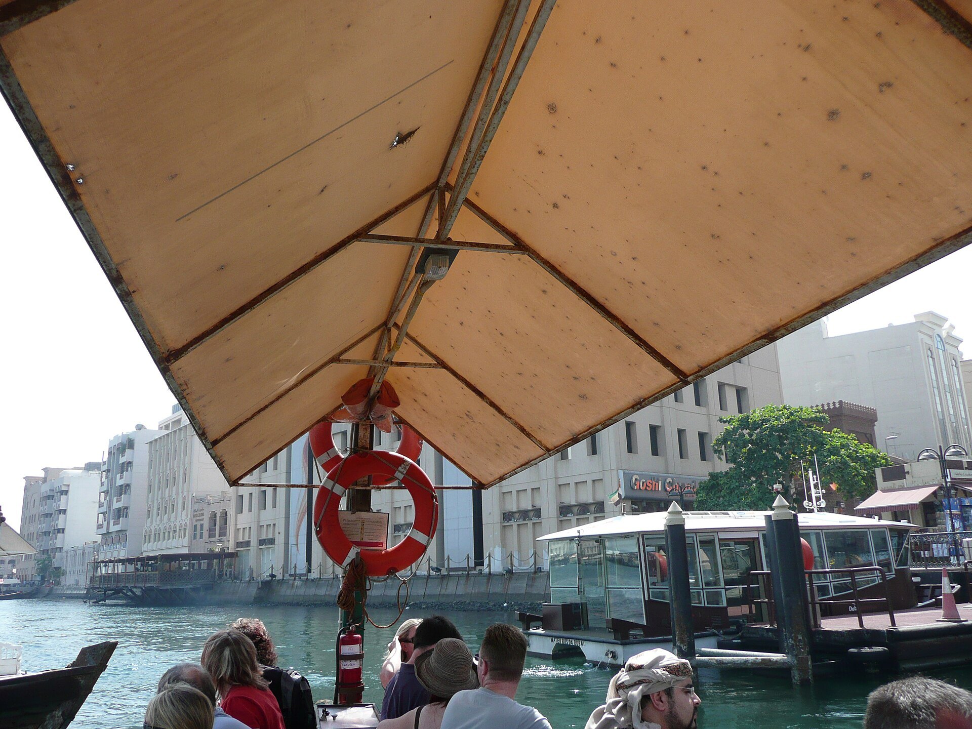 Riding a one dirham abra across Dubai Creek between Bur Dubai and Deira