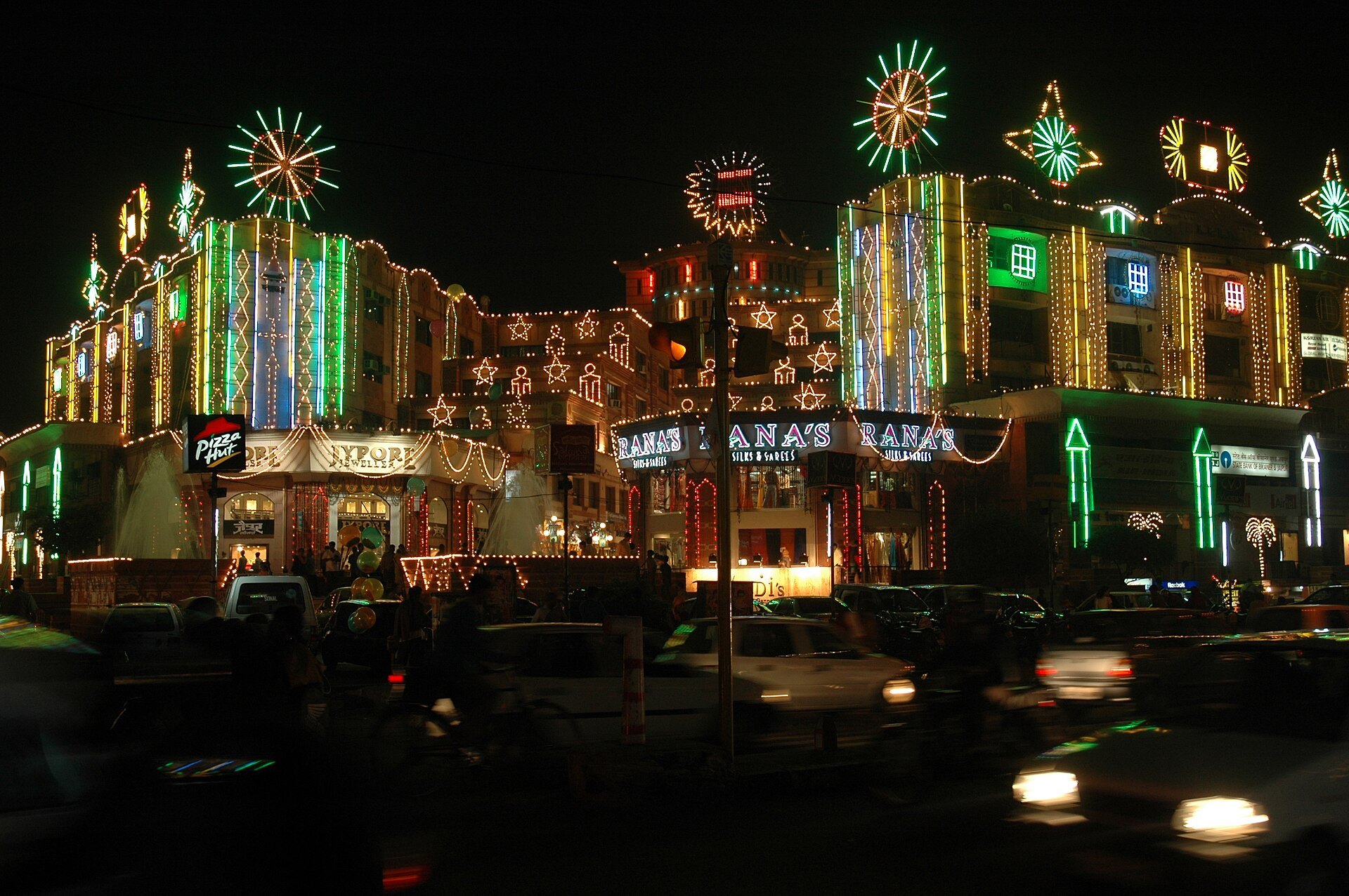 Jaipur market buildings covered in Diwali lights at night