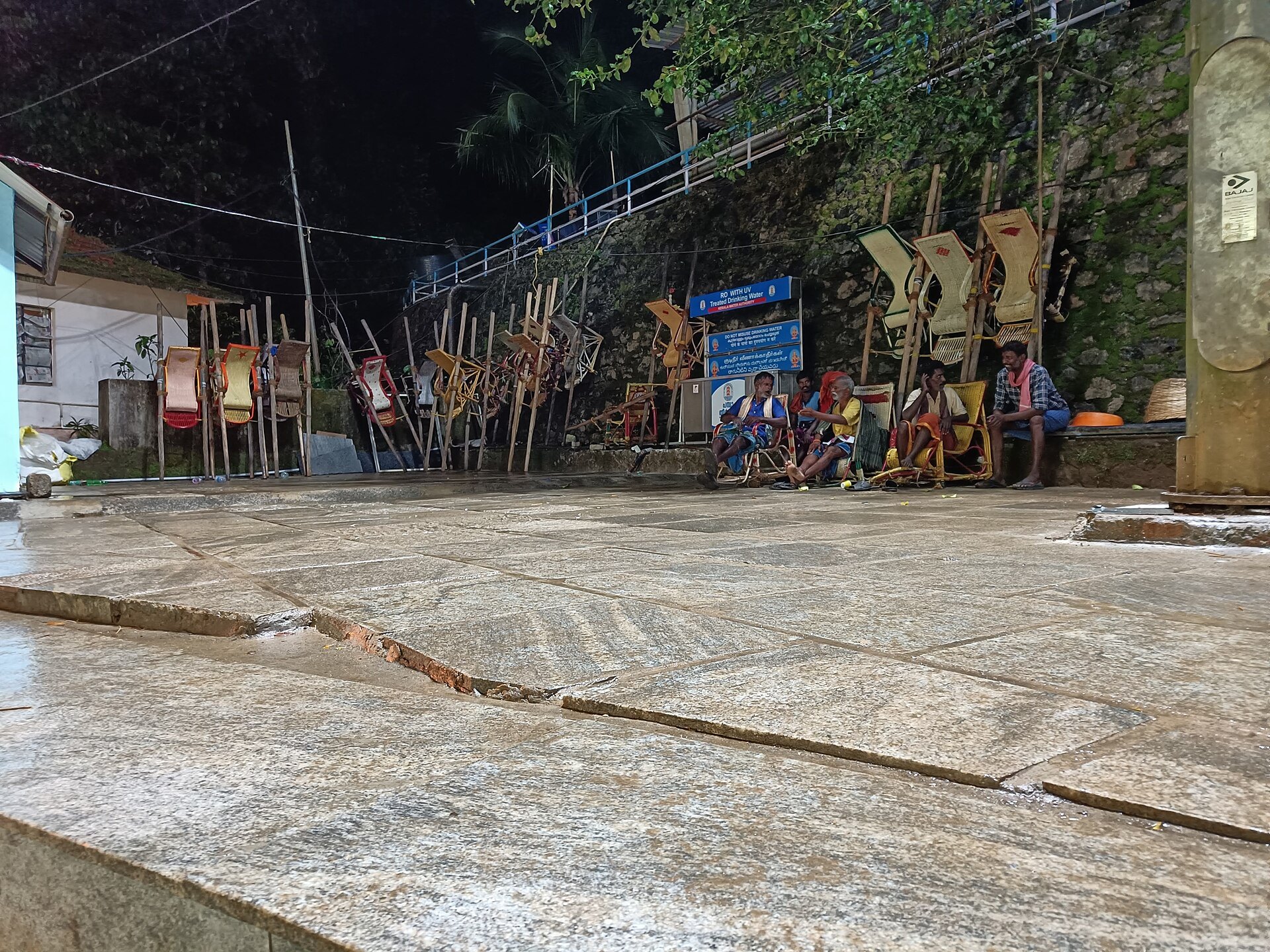 Dolly chairs lined up for hire on the Sabarimala route at night
