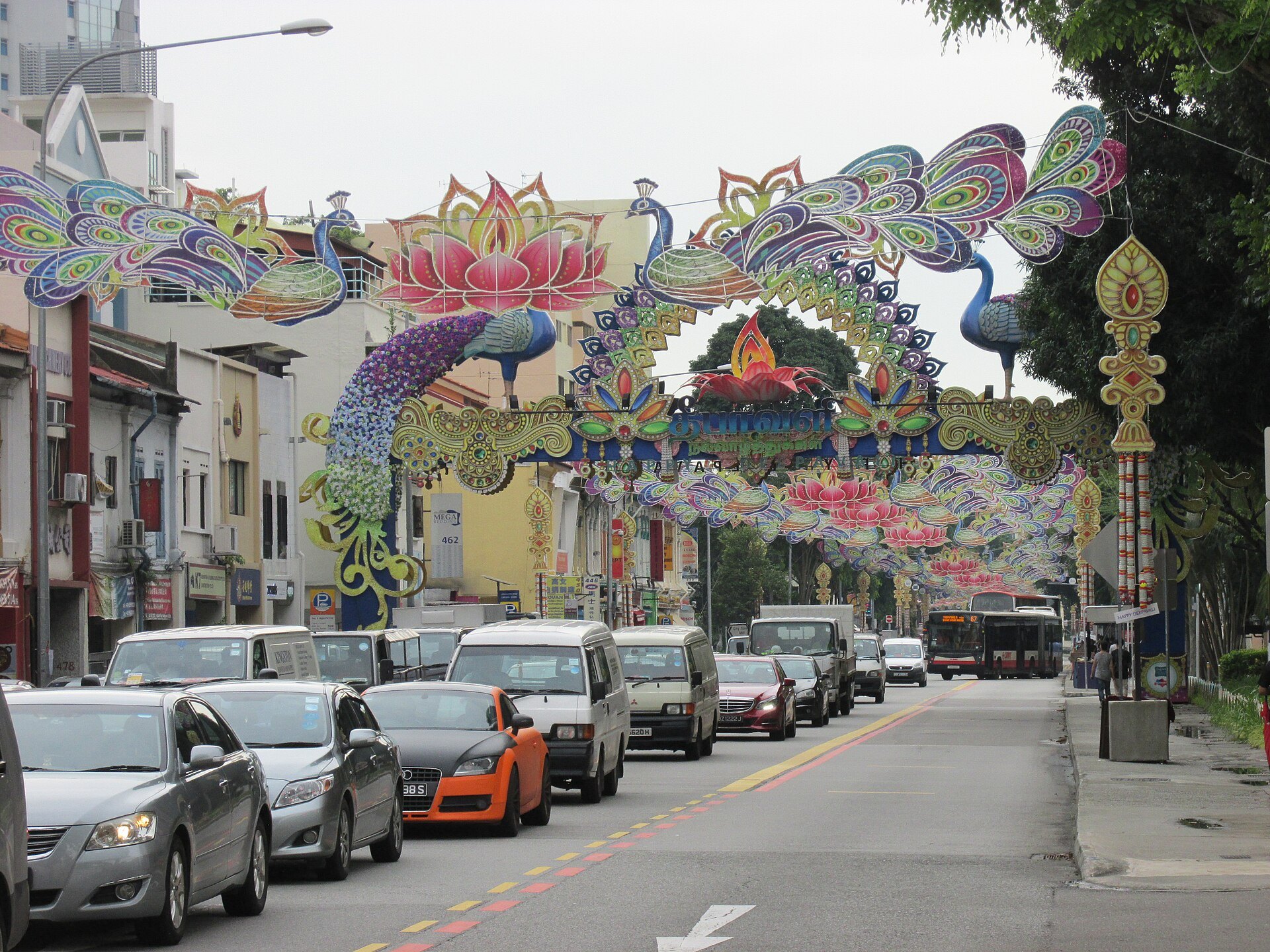 Peacock and lotus Deepavali decorations over Serangoon Road in Little India, Singapore, by day
