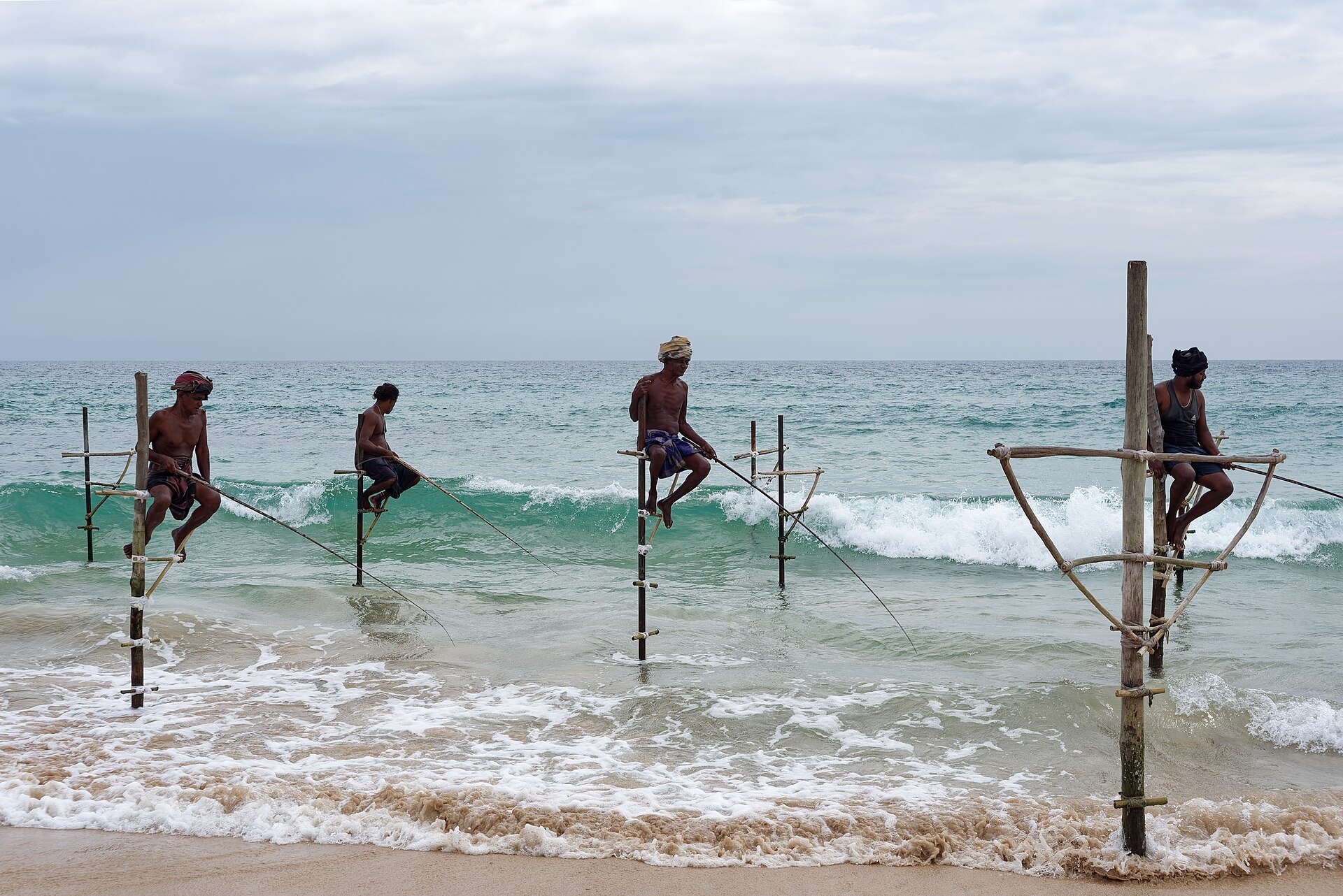 Stilt fishermen at Koggala between Galle and Weligama, Sri Lanka