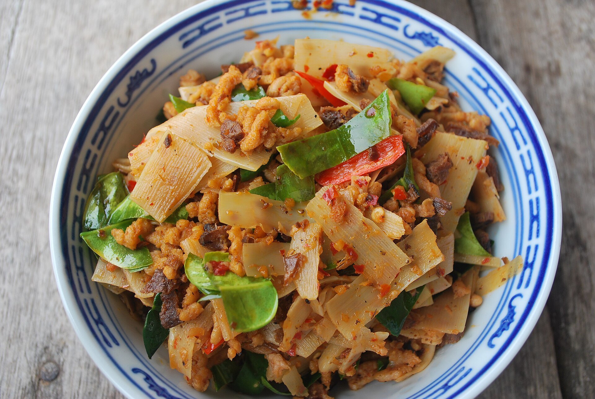 Thai jay food, a bowl of stir fried bamboo shoots with soy protein